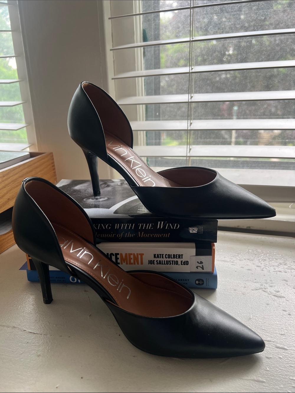 Black Calvin Klein pointed toe pumps (Gloria d’Orsay Pump)